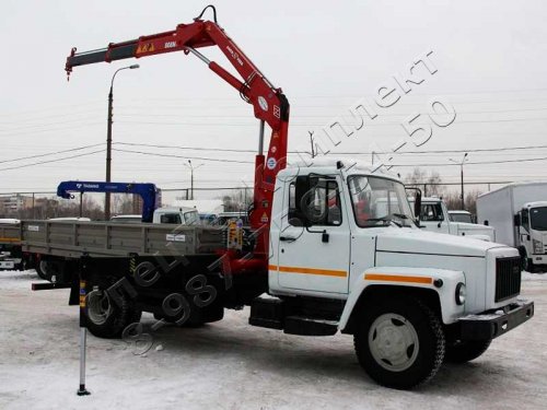 Cамосвал на шасси ГАЗ-3309 с крано-манипуляторной установкой